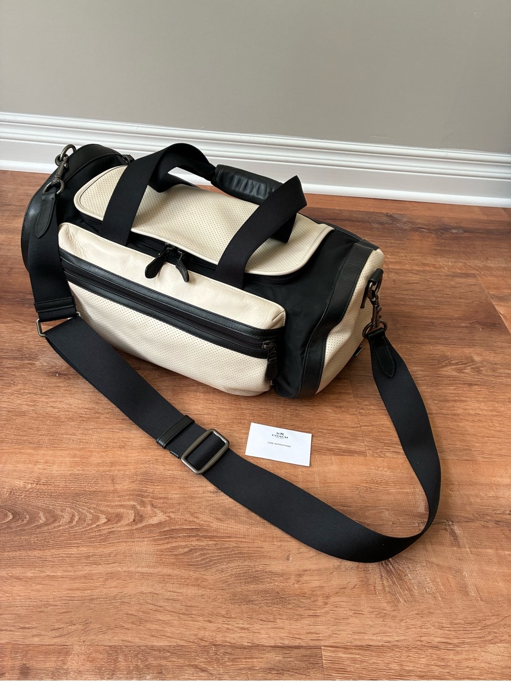 Coach Terrain Trek Duffel Bag In Perforated Leather Chalk / Black F56875 Unisex
